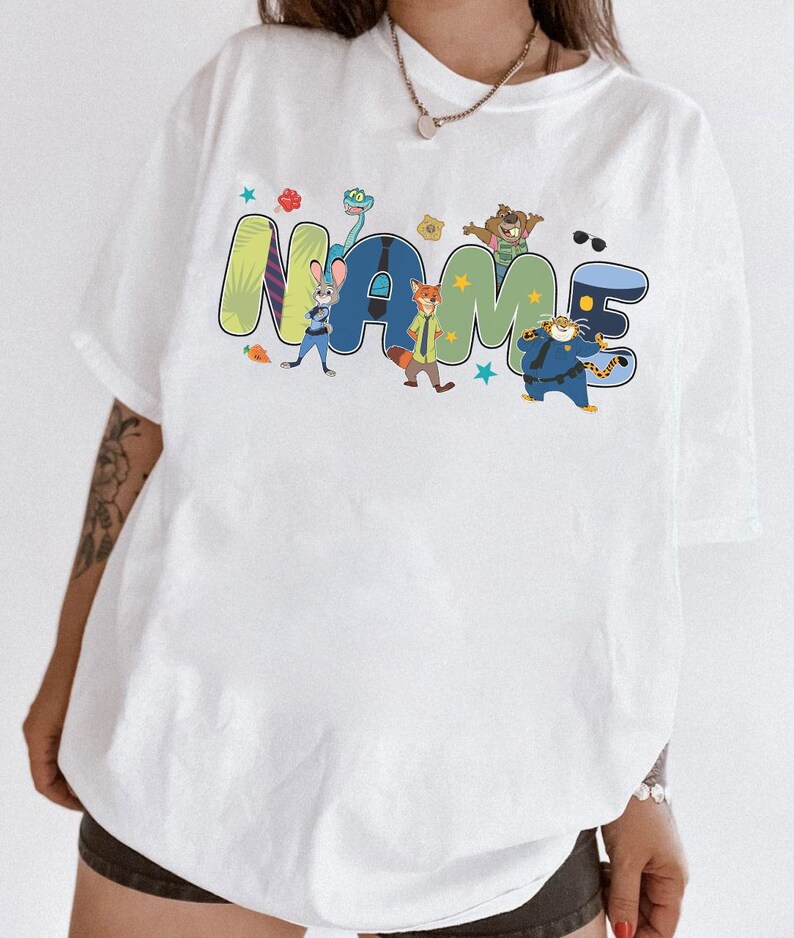 Camiseta personalizada con nombre de los personajes de Zootrópolis 2, Camiseta de Judy Hopps y Nick Wilde de Zootrópolis, Camiseta familiar para viaje a Disneyland, Reino Mágico imagen 2