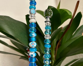 Unique one of a kind! Set of 2 sky blue/aqua fairy sticks made of all glass beads