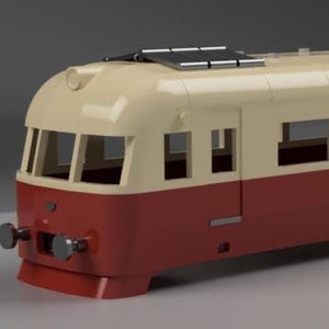 May include: A model train car in cream and maroon. The train car has rectangular windows and a door. The roof has a series of dark panels. The front of the train has a rounded shape with a small red bumper and two silver details.