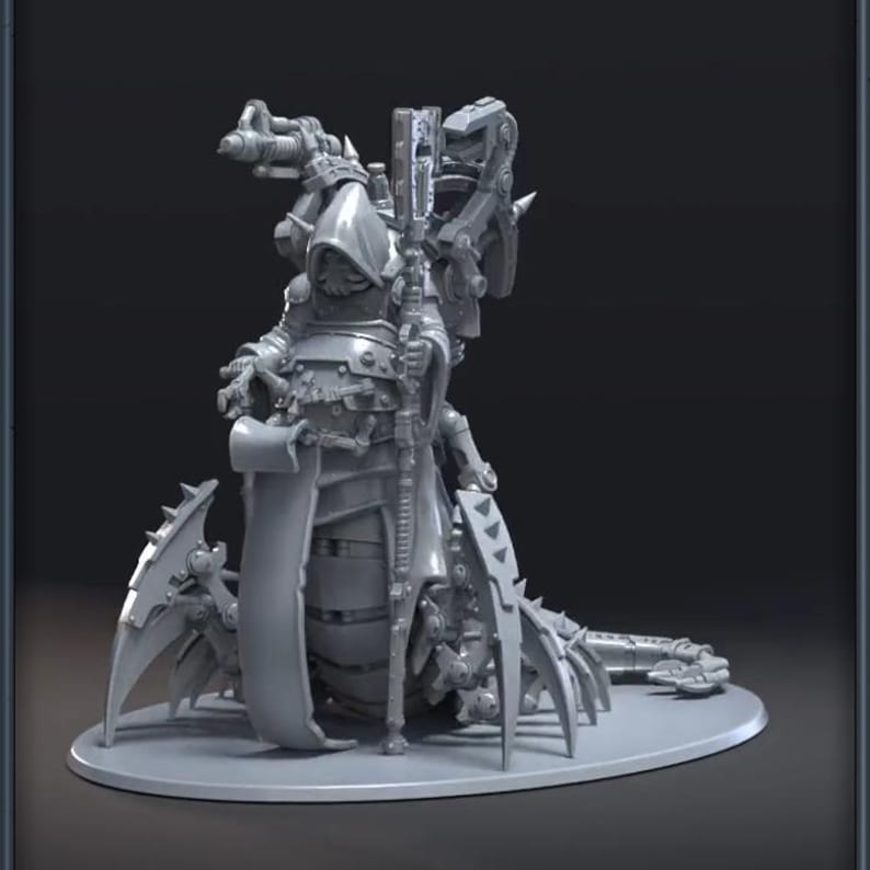 May include: A gray, detailed miniature figure of a hooded character with mechanical enhancements, holding a staff. The figure is on a circular base, with intricate armor and robotic elements. The overall design suggests a science fiction or fantasy theme.