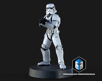 May include: A white Stormtrooper figure, holding a black blaster, stands on a black circular base. The figure has black detailing and is posed in a ready stance. The figure is a collectible item.