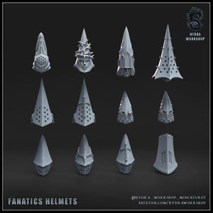 May include: A collection of twelve grey miniature helmets arranged in a grid, featuring various pointed, conical, and spiked designs. Some helmets include face masks, cross motifs, or crown-like details. Text reads FANATICS HELMETS and HYDRA WORKSHOP.