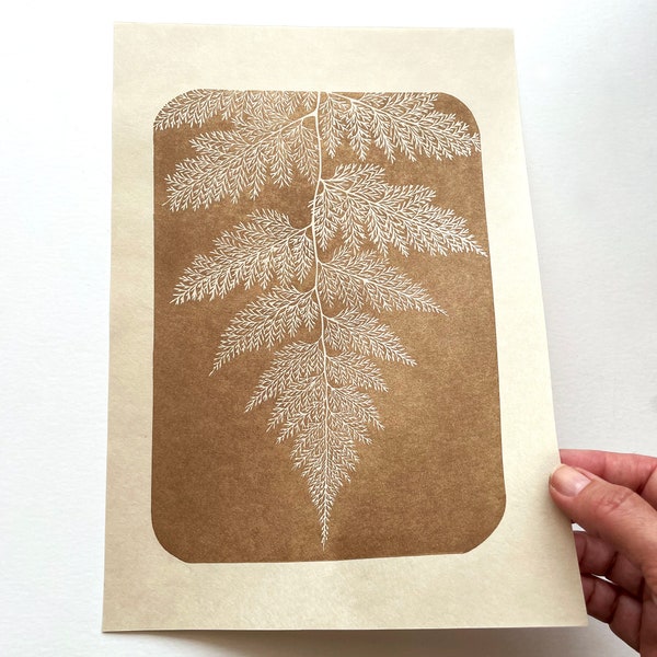 Gold linocut print of a fern leaf, original artwork hand printed on Japanese paper