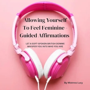 May include: Pink and white headphones on a pink background. Text on the image reads "Allowing Yourself To Feel Feminine - Guided Affirmations" and "LET A SOFT-SPOKEN BRITISH DOMME WHISPER YOU INTO WHO YOU ARE".