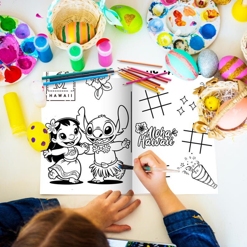 May include: A coloring book featuring Lilo and Stitch characters, with the text "Aloha Hawaii". The image includes colored pencils, paint, and decorated Easter eggs, suggesting a craft or activity theme.