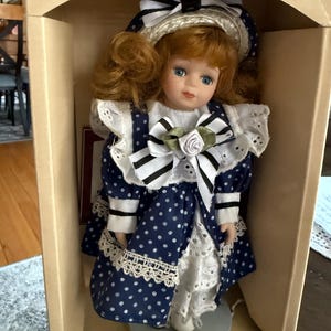 Vintage doll Signature Collection Petite Porcelain Doll,a limited edition,hand-crafted porcelain doll over 20 years old great condition doll