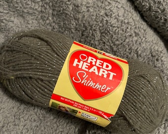 Red heart Shimmer / yarn/ 4 worsted weight/  280 yards  in color pewter / non pet or smoke home/ retired