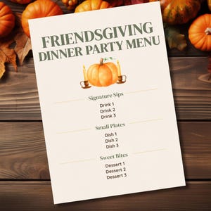 May include: A cream-coloured menu card titled FRIENDSGIVING DINNER PARTY MENU in dark green text. It features a watercolour illustration of an orange pumpkin flanked by two lit candles. The menu includes sections for Signature Sips, Small Plates, and Sweet Bites.