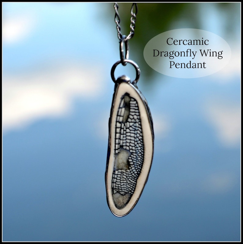 Handmade Ceramic Dragonfly Wing Pendant encased in metal. Designed by Louisiana Artisans at Bayou Glass Arts in USA.