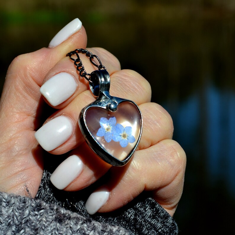 Forget Me Not Heart Pendant Necklace Handmade by Artisan at Bayou Glass Arts. 2 dry pressed flower blooms encased in heart shaped cabochons. In remembrance. Best gift for Mom Grandma BFF Girlfriend Christmas Birthday Anniversary