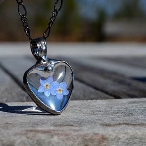 Forget Me Not Heart Pendant Necklace Handmade by Artisan at Bayou Glass Arts. 2 dry pressed flower blooms encased in heart shaped cabochons. In remembrance. Best gift for Mom Grandma BFF Girlfriend Christmas Birthday Anniversary