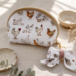 Mini Dumpling Bag with Puffy Bow Charm – Chickens Duck Cloth Quilted Makeup Pouch
