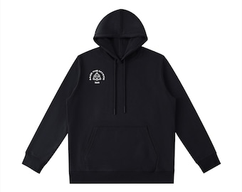 May include: Black hooded sweatshirt with a front pocket and a drawstring hood. The sweatshirt features a white graphic on the chest that includes the text "RAGE THE MYSTIC" around a symbol. The bottom of the graphic has the number "1111".