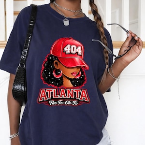 May include: A white ceramic mug with a black handle and the text "But First, Coffee" in a handwritten style. The mug is on a white surface. The mug is approximately 4 inches tall.