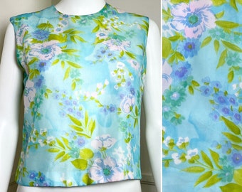 Camiseta corta con estampado floral azul vintage de los años 60 de Adelaar