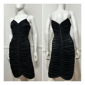 Small to Medium 1980s Vintage Black Coffin Pleated Mini Dress by Betsy & Adam