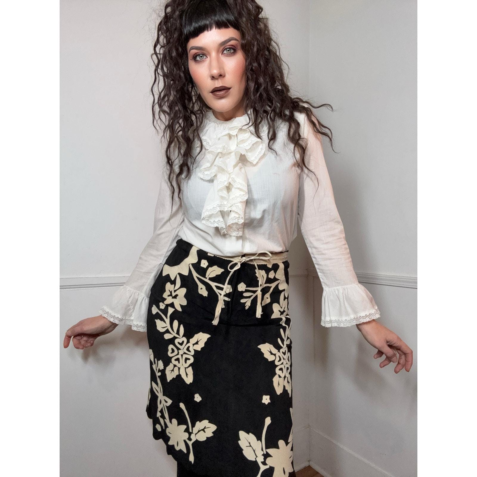 Moda InternationalのY2Kヴィンテージブラック＆タンフローラルレザー