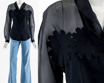 Zwarte doorschijnende zijden rozetblouse Italiaanse designer