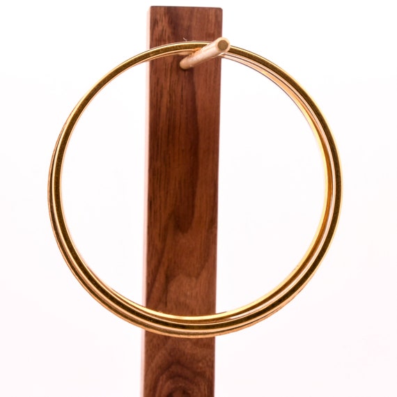 stack of gold bangles arm stack - image 3