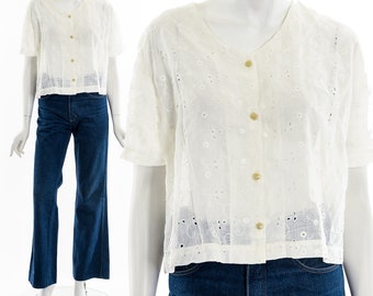 Blusa blanca vintage de los años 70