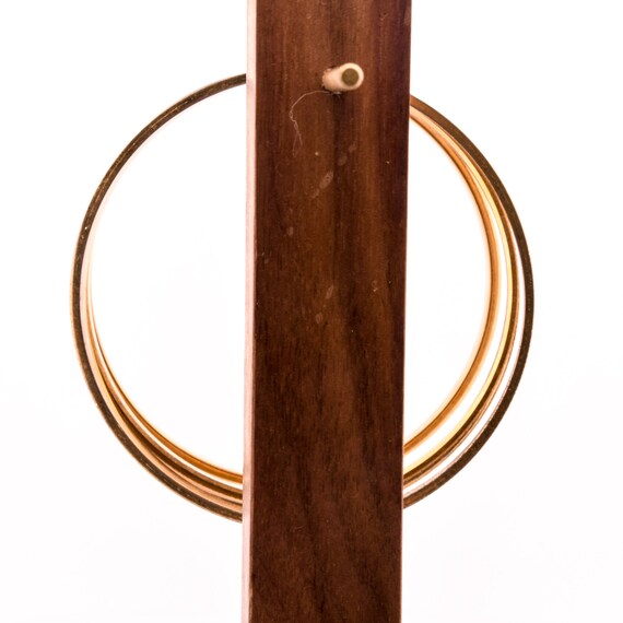 stack of gold bangles arm stack - image 7