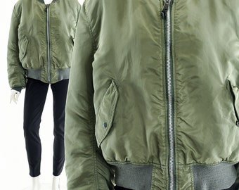 Grüne Wendejacke aus den 90ern