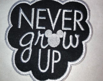 Never Grow Up Embroidered Patch - Iron On