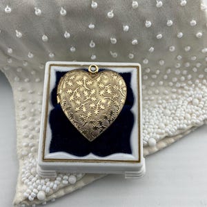 Vintage Gold Tone Heart Locket with Reousse Leaf Design, Sentimental Keepsake Jewelry