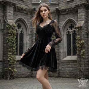 Elegant gothic black dress featuring sheer lace long sleeves, sweetheart neckline, and velvet bodice. Perfect for dark fantasy, witchy, or Victorian-inspired outfits. This gothic velvet dress suits parties, date nights, and alternative fashion events with its romantic and vintage silhouette.