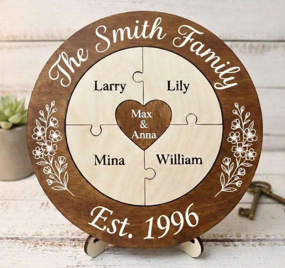 A wooden family name puzzle with a heart center that can serve as a wedding unity ceremony piece OR a shelf display — unusually versatile for a personalized craft item.
