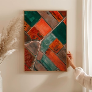 Landscape aerial view poster – Abstract art of fields in orange & green, drone photo print, as wall art, graphic poster for living room