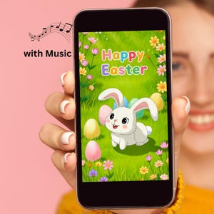 May include: A smartphone displays a colorful "Happy Easter" graphic with a cartoon bunny, Easter eggs, and flowers. The phone also shows musical notes and the words "with Music". The background is a soft pink.