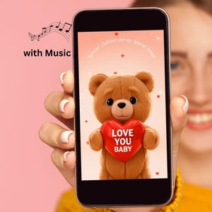 May include: A smartphone displays a teddy bear holding a red heart with the words "LOVE YOU BABY." The screen also shows the text "Special Delivery for my Special Person." Musical notes and the words "with Music" are also visible.