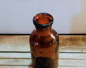 Botella miniatura Anyiqeue de Lysol de vidrio marrón con relieve. Botella pequeña.