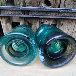 Set of two Vintage 1940s aqua green/blue power line insulators.