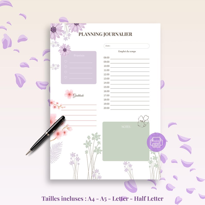 May include: A floral-themed planner with the text "PLANNING JOURNALIER" at the top. The planner includes sections for priorities, gratitude, and notes, with a time schedule from 8:00 to 20:00. A black pen rests on the page. Sizes included: A4, A5, Letter, Half Letter.