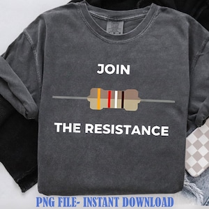 May include: A charcoal gray short-sleeve t-shirt featuring the white text JOIN THE RESISTANCE above and below a graphic of an electronic resistor with orange, red, white, and brown color bands on a tan body with thin gray wire leads.