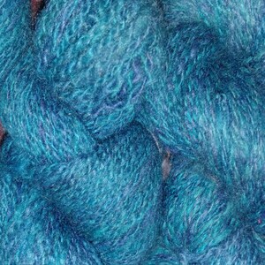 Hand spun, hand dyed wool, mohair blend worsted yarn