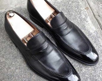 Handgjorda svarta läderloafers: Herrskor med hög klack