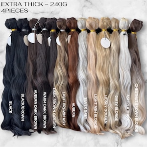 May include: A set of four extra thick 240g hair extension bundles arranged in a row, featuring various shades including black, brown, auburn, silver grey, ash blonde, and chestnut brown blonde, each labeled with its specific color name.