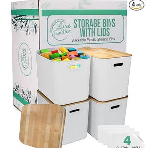 May include: White stackable plastic storage bins with lids. The bins have a textured pattern and bamboo-style lids. The image shows a set of four bins, with a box that reads "STORAGE BINS WITH LIDS". The set includes four custom labels.