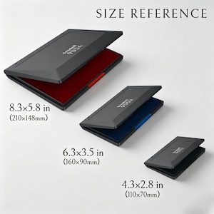 May include: Three black ink pads with open lids, displaying red, blue, and black ink pads. The largest pad measures 8.3 x 5.8 inches (210x148mm), the medium pad is 6.3 x 3.5 inches (160x90mm), and the smallest is 4.3 x 2.8 inches (110x70mm). The text "SIZE REFERENCE" is at the top.