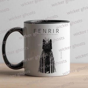 May include: White ceramic mug with a black interior, handle, and rim. The mug features a black illustration of a wolf with the word "FENRIR" above it. The text "END OF MEN" is printed vertically on the right side of the mug.