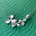 see more listings in the Floral Necklaces section