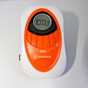 Radio Shack digitale armband radio AM/FM oranje stopwatch getest – sportfitness Runner's