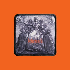 May include: A square black and white patch featuring a detailed illustration of a figure with a halo, surrounded by others in robes. The word "Behemoth" is in orange script, with "Evangelion" below it.
