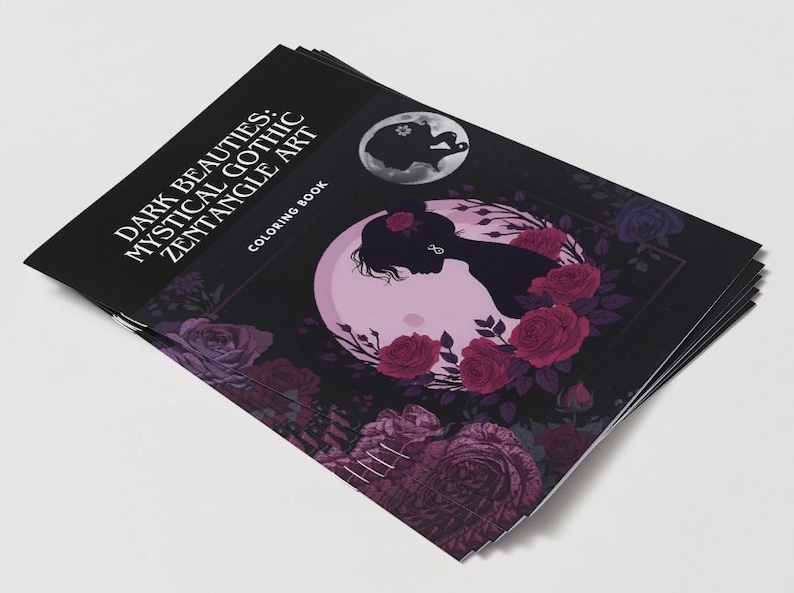 Puede incluir: Una pila de libros para colorear titulada "Dark Beauties: Mystical Gothic Zentangle Art". La portada presenta una silueta del perfil de una mujer frente a una luna rosa, rodeada de rosas.