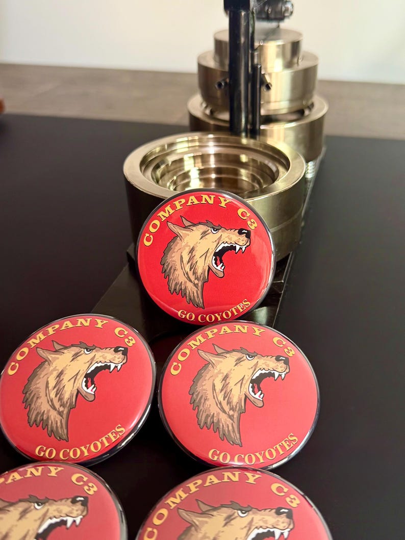 Custom logo pinback buttons, personalized business buttons, company logo badges, promotional marketing buttons, branded advertising products, trade show giveaways, corporate event merchandise, custom business branding.