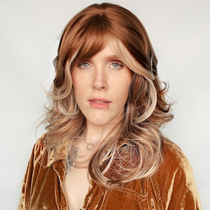 Reddish Brown Wig · Long Wavy Caramel Brunette Blonde Highlights Glueless Unit with Bangs · Golden hour