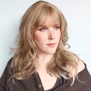 Wavy blonde wig, long blonde wig with bangs, brownish blonde wig -- Gilded Leaf